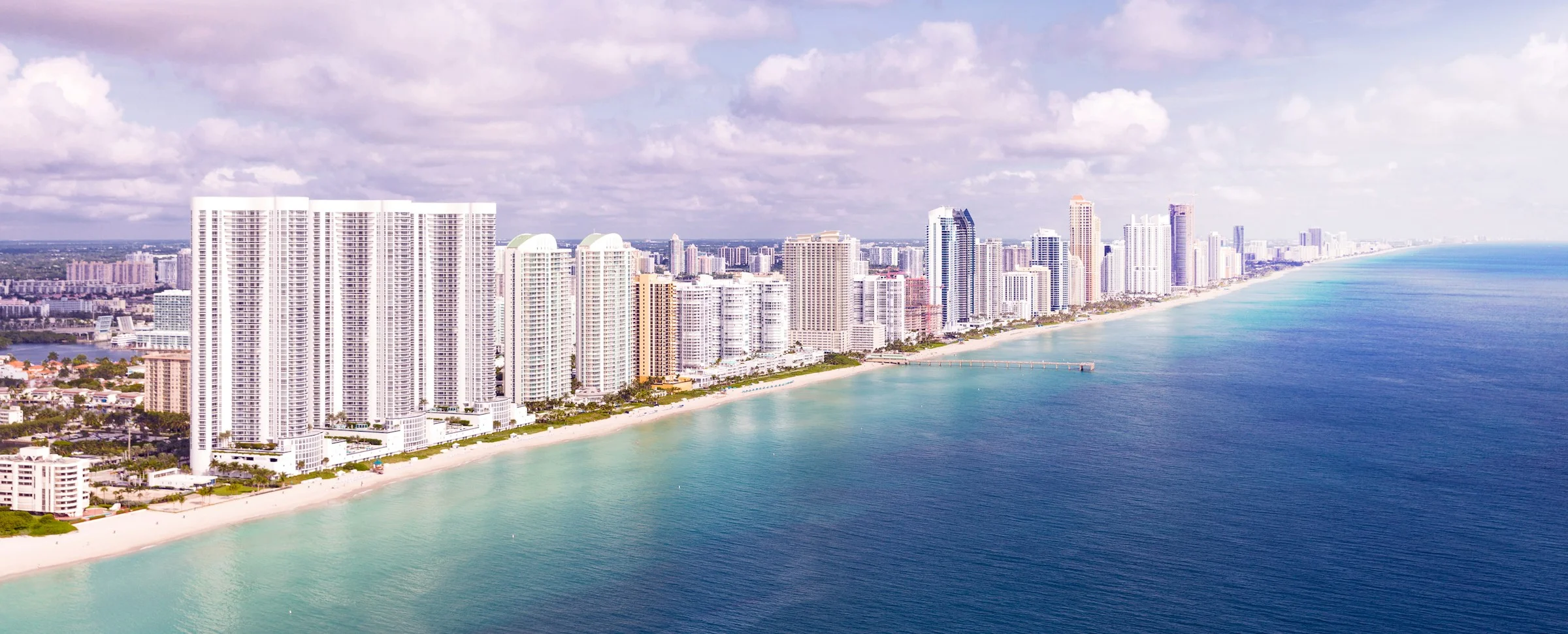 Completed oceanfront condominium towers along Sunny Isles Beach, Florida.